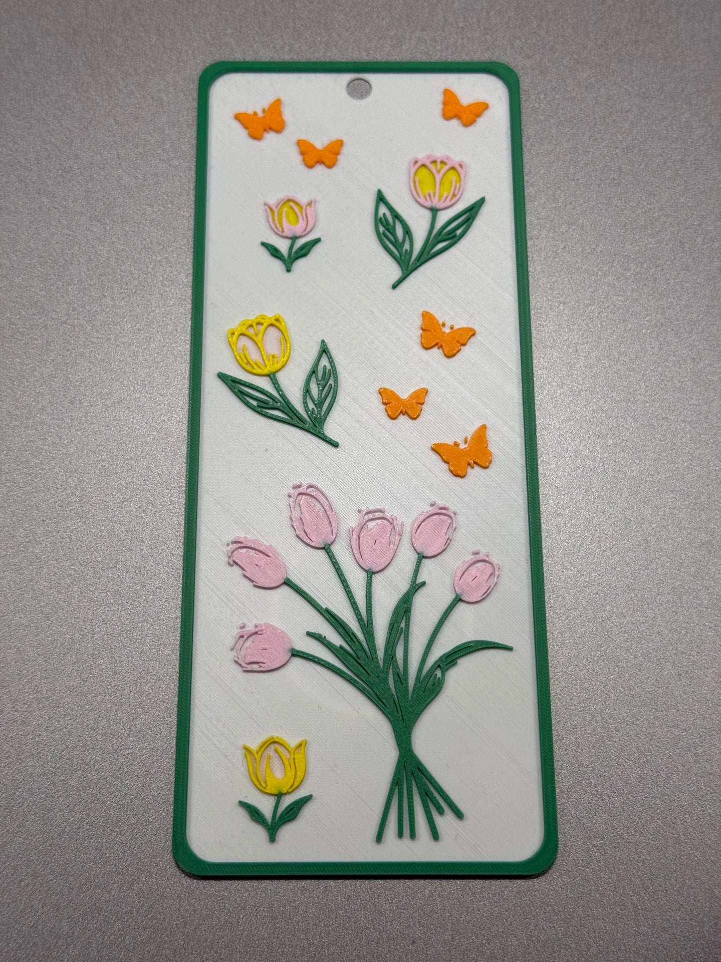 Decorative card with floral designs on a gray background